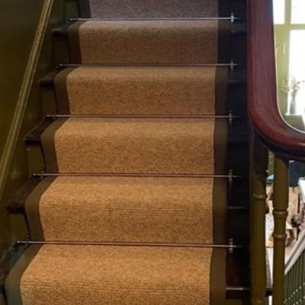 natural stairs carpet with green binding