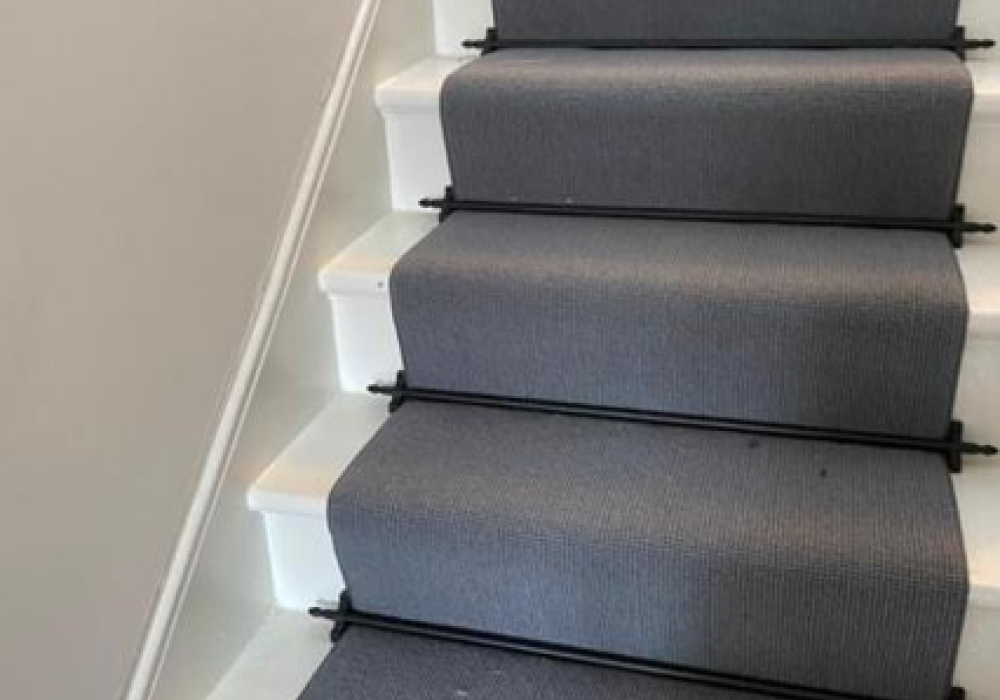 Photo image for Grey Wool Natural Loop Carpet with American Binding Black Stairrods with acorn genial